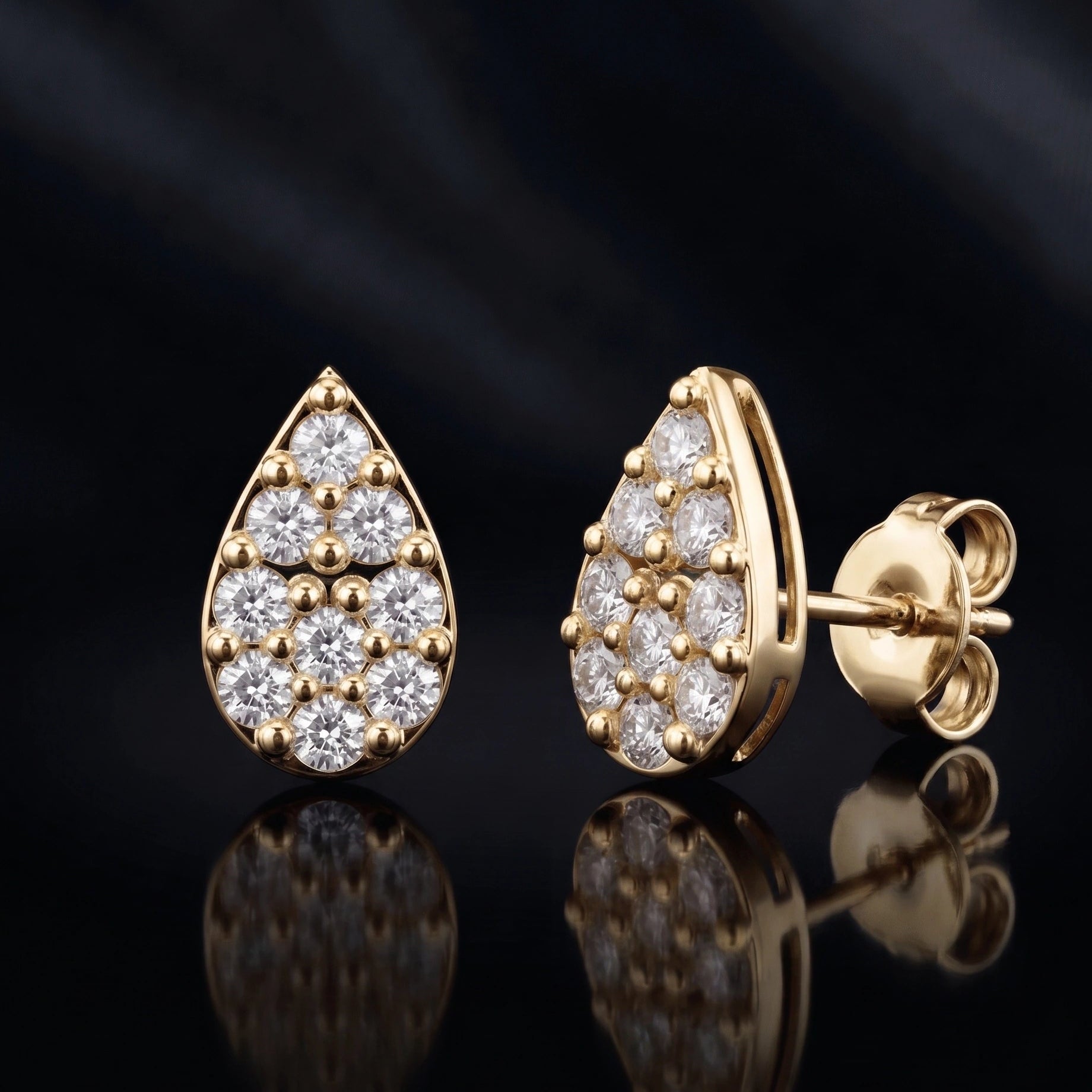 Zirconia Tear Drop Stud Earrings